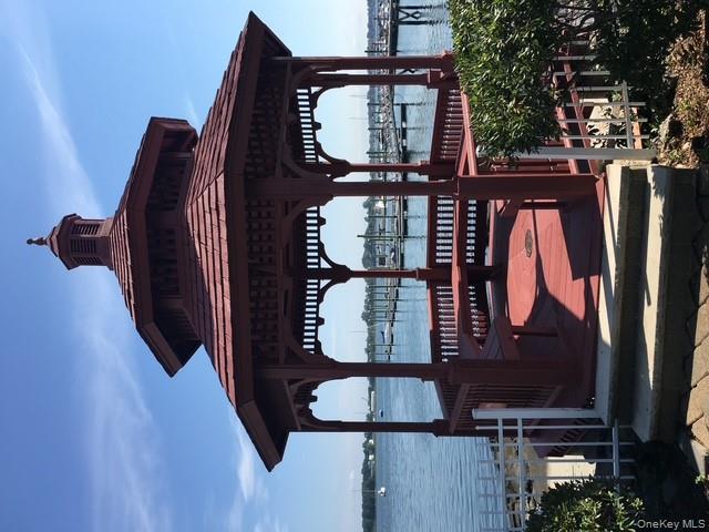 204 Outlook Avenue Bronx, NY 10465 - Photo 3 of 12 a front view of a house with garden