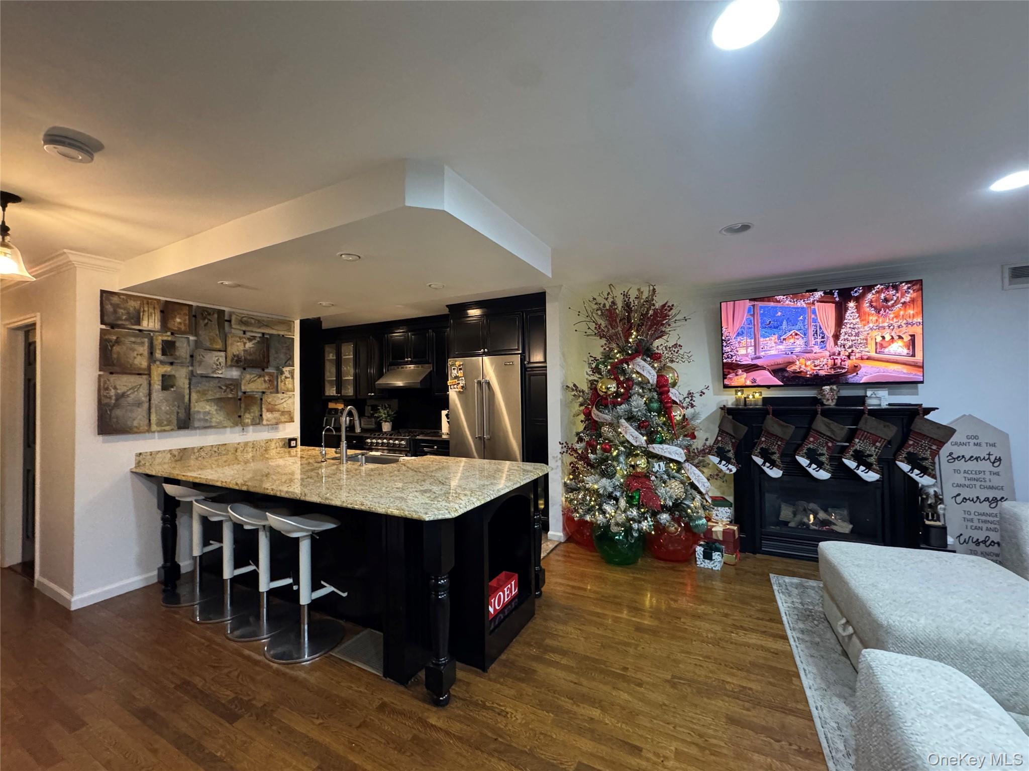 204 Outlook Avenue Bronx, NY 10465 - Photo 7 of 12 a view of a dining room with furniture wooden floor and chandelier