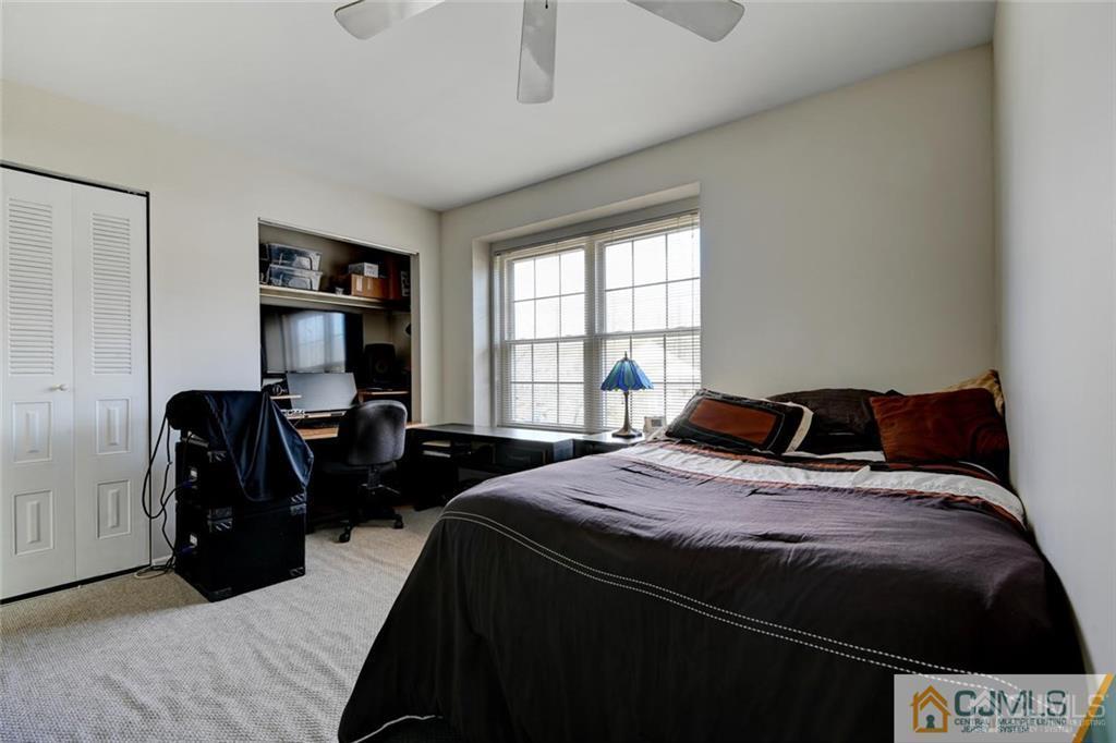 360 Constitution Circle North Brunswick, NJ 08902 - Photo 19 of 21 a bedroom with double bed and a window