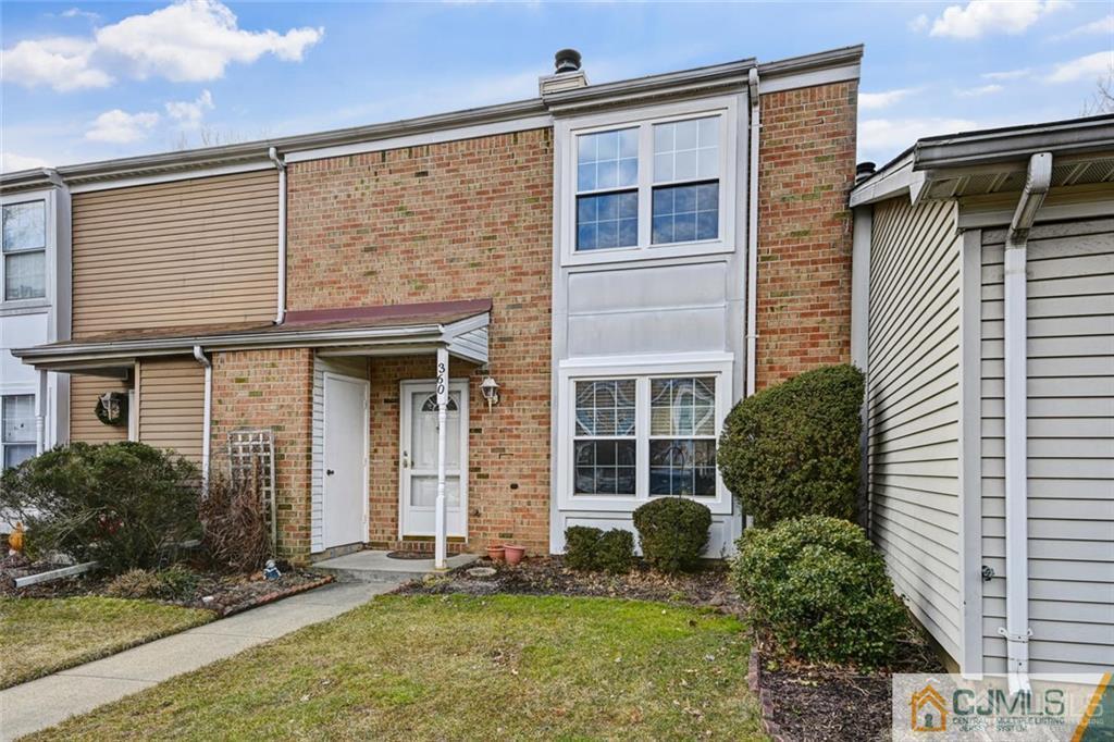 360 Constitution Circle North Brunswick, NJ 08902 - Photo 2 of 21 front view of a house with a yard