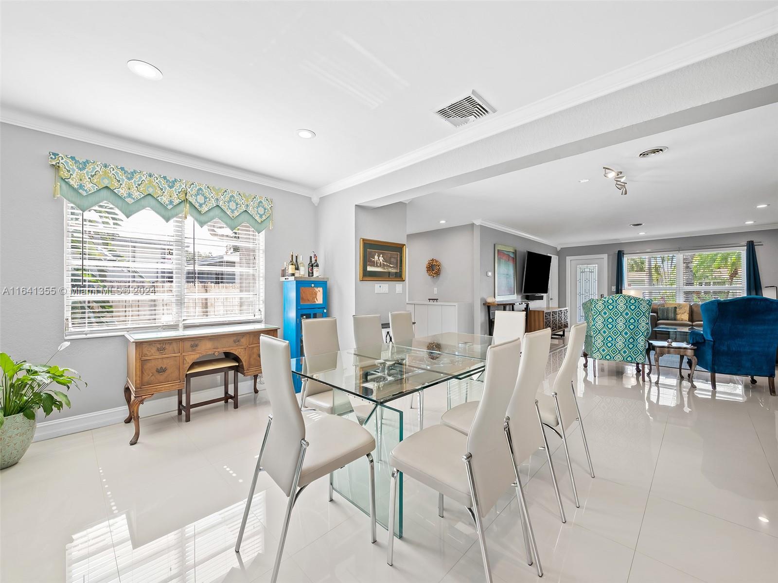 3904 Arthur Street Hollywood, FL 33021 - Photo 12 of 32 a view of a dining room with furniture and a large window