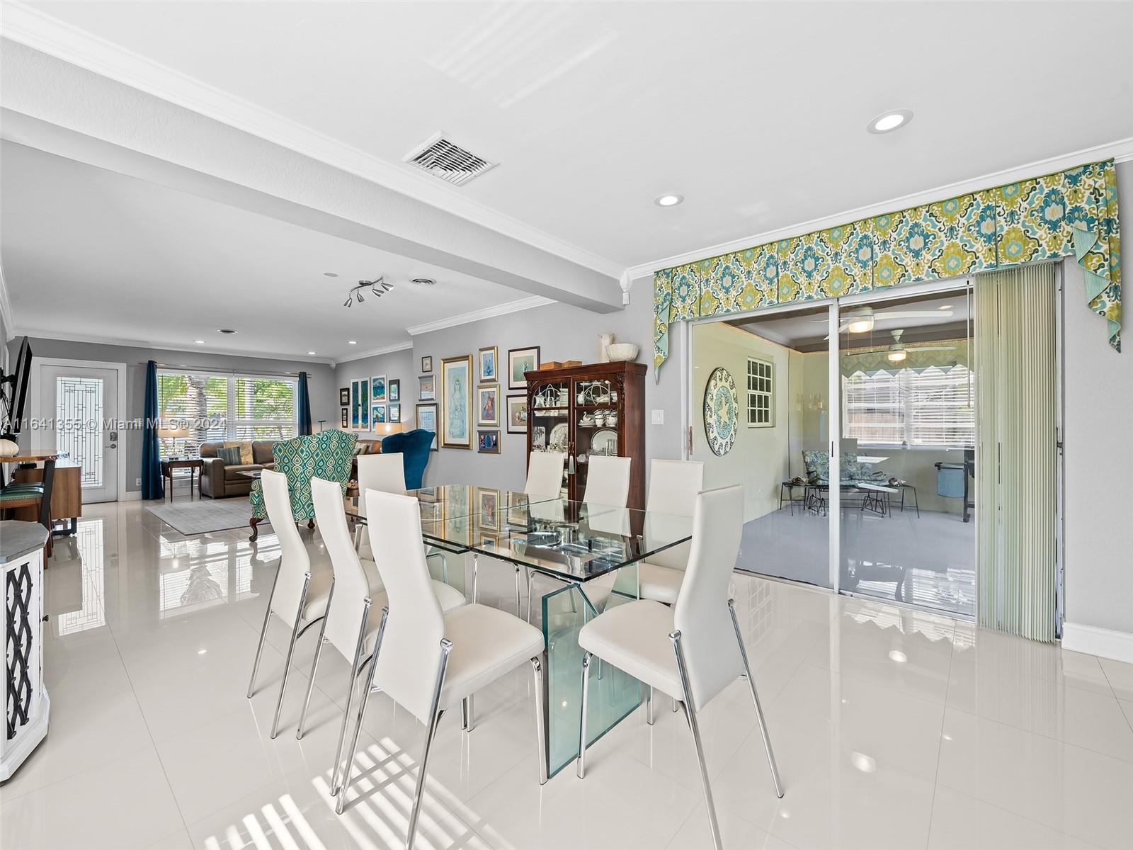 3904 Arthur Street Hollywood, FL 33021 - Photo 13 of 32 a view of a dining room with furniture