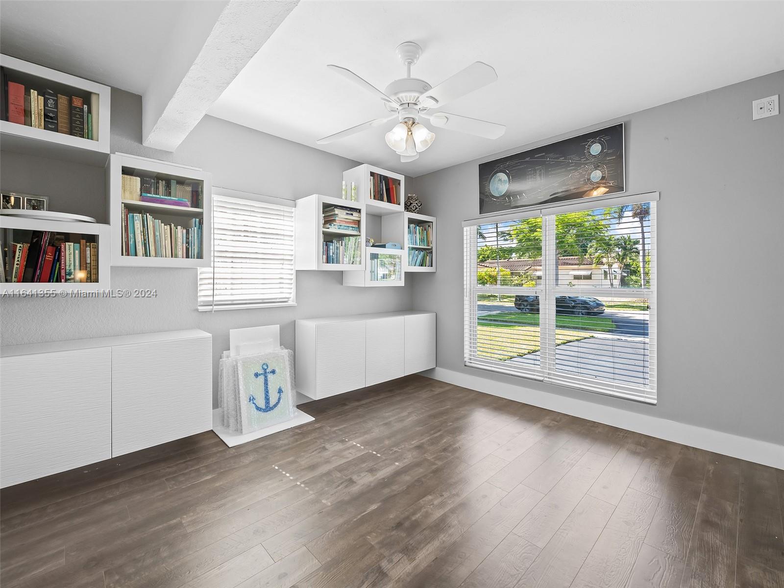 3904 Arthur Street Hollywood, FL 33021 - Photo 20 of 32 a living room with furniture and a large window