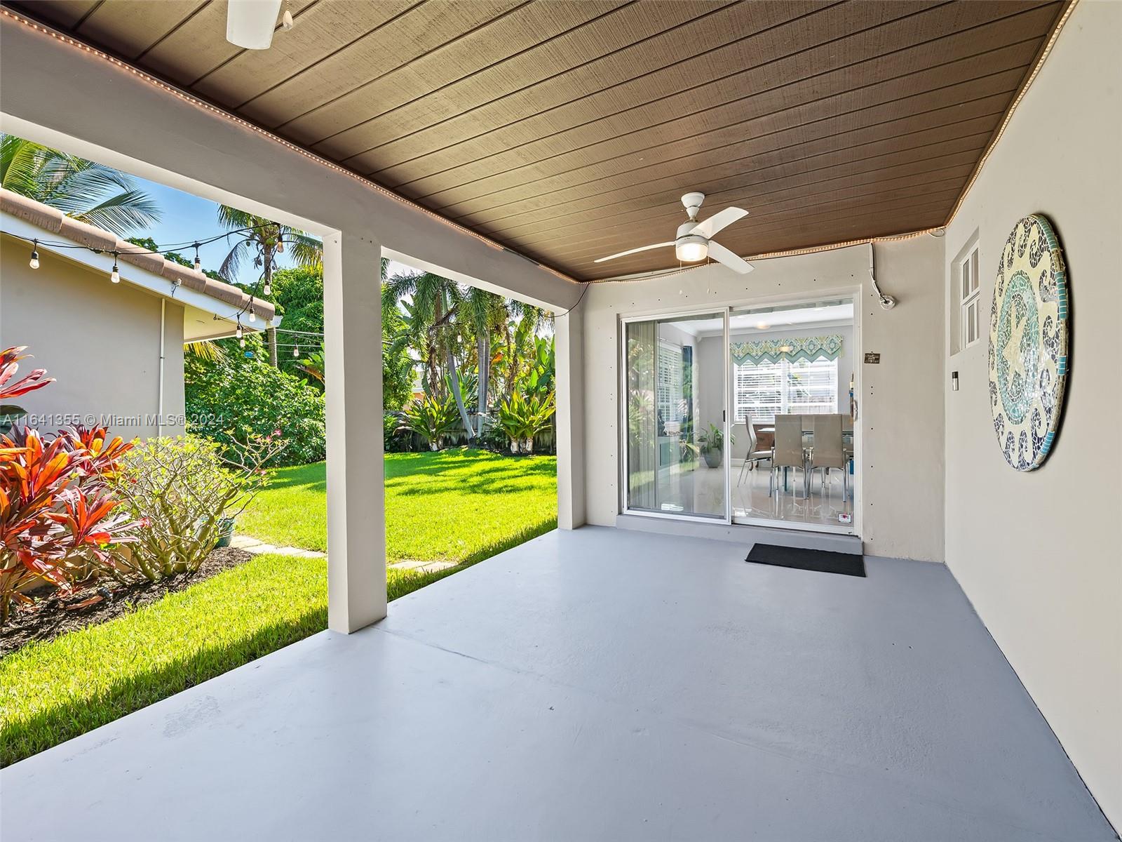 3904 Arthur Street Hollywood, FL 33021 - Photo 22 of 32 a view of an entryway with garden