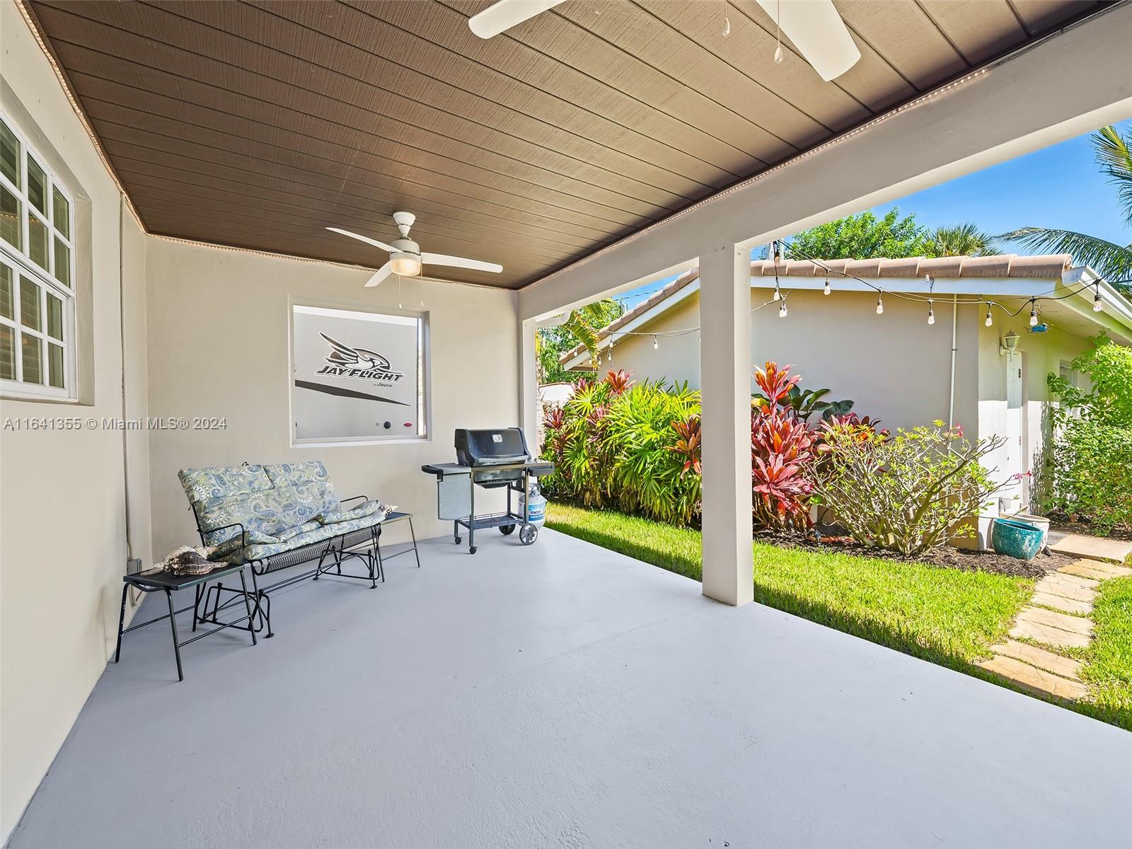 3904 Arthur Street Hollywood, FL 33021 - Photo 23 of 32 a outdoor space with furniture