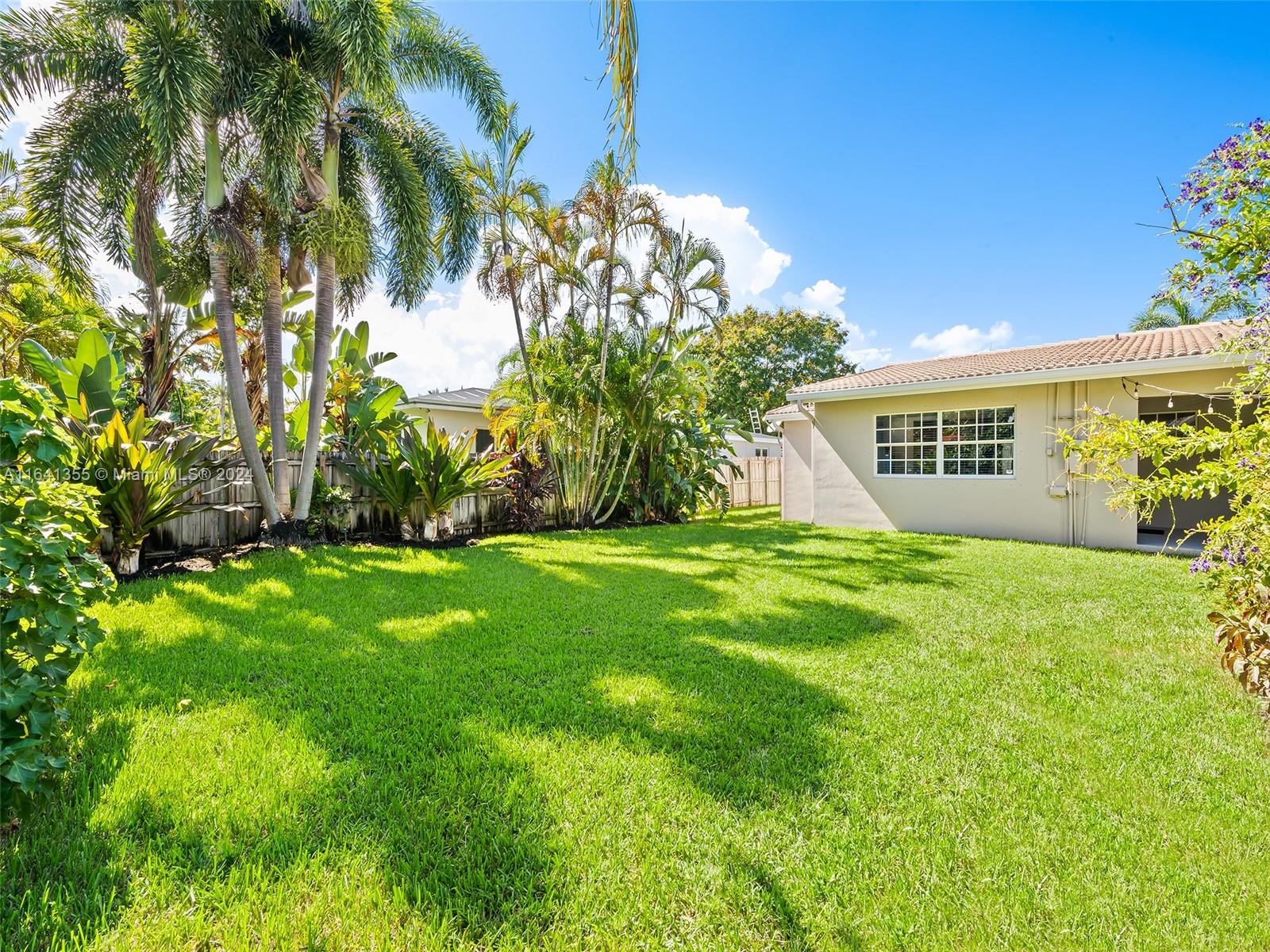 3904 Arthur Street Hollywood, FL 33021 - Photo 24 of 32 a view of an house with backyard space and garden