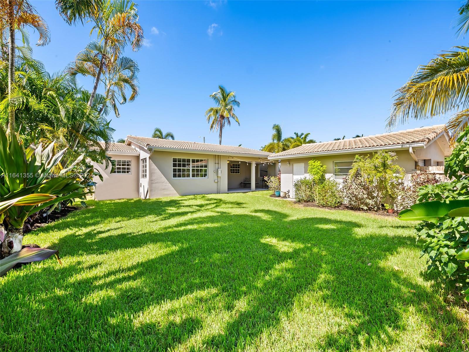 3904 Arthur Street Hollywood, FL 33021 - Photo 25 of 32 a view of a house with a yard