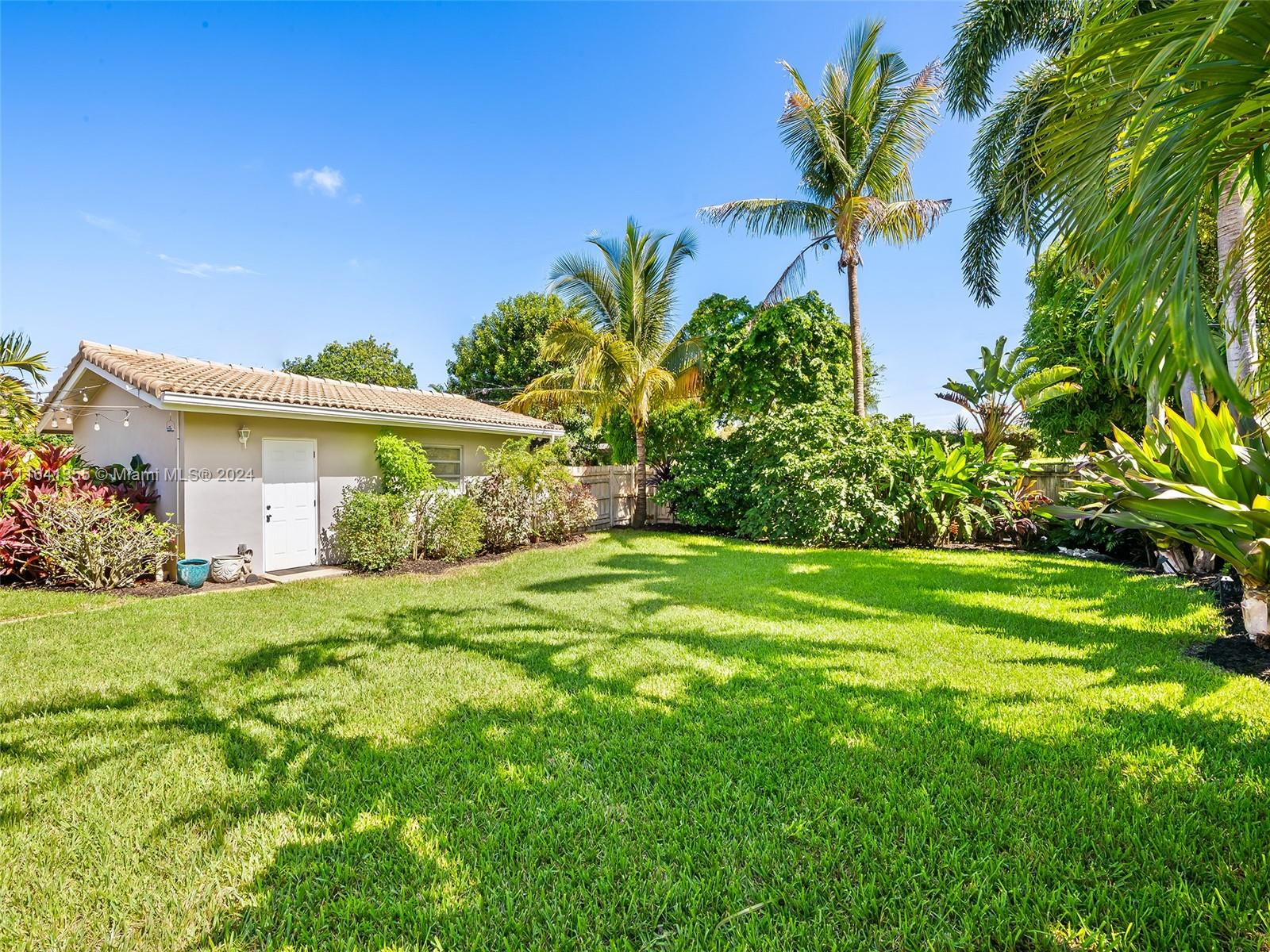 3904 Arthur Street Hollywood, FL 33021 - Photo 26 of 32 a front view of a house with garden