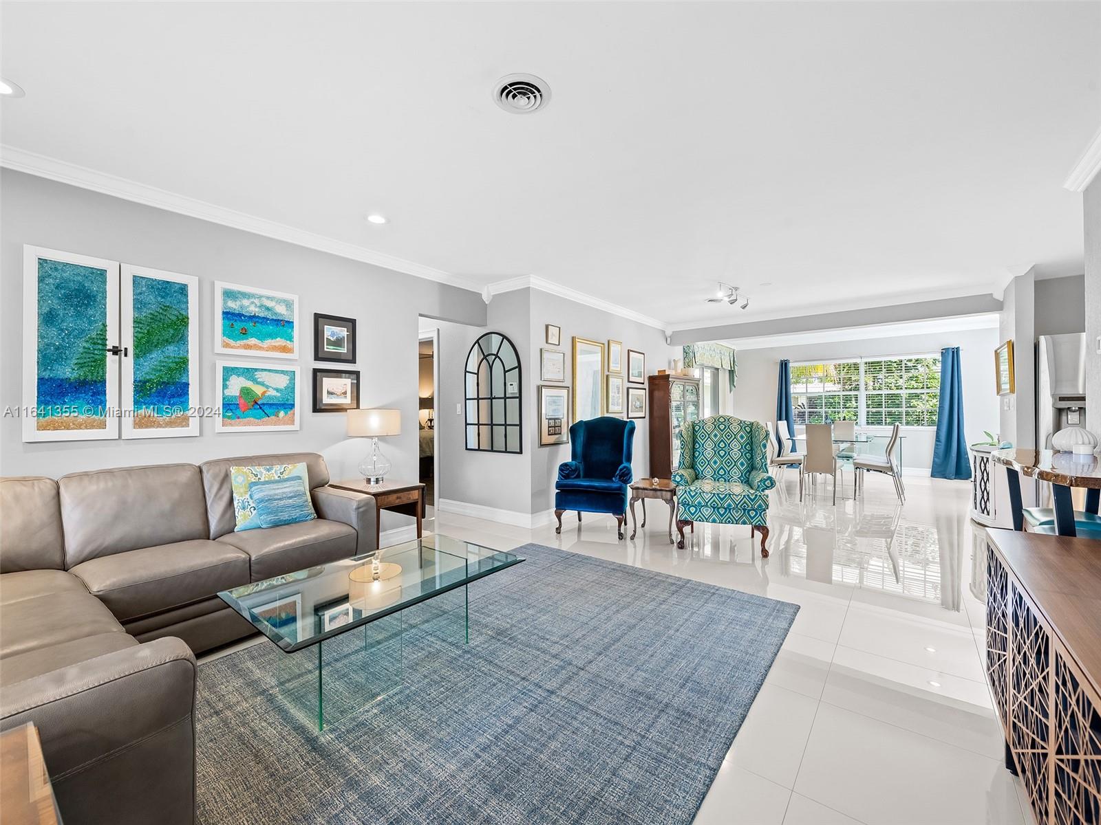 3904 Arthur Street Hollywood, FL 33021 - Photo 5 of 32 a living room with furniture and a large window
