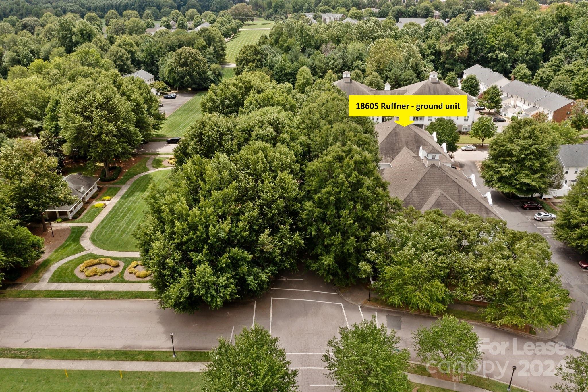 18605 Ruffner Drive, Unit 1C Cornelius, NC 28031 - Photo 2 of 27 an aerial view of a house with a swimming pool yard and outdoor seating