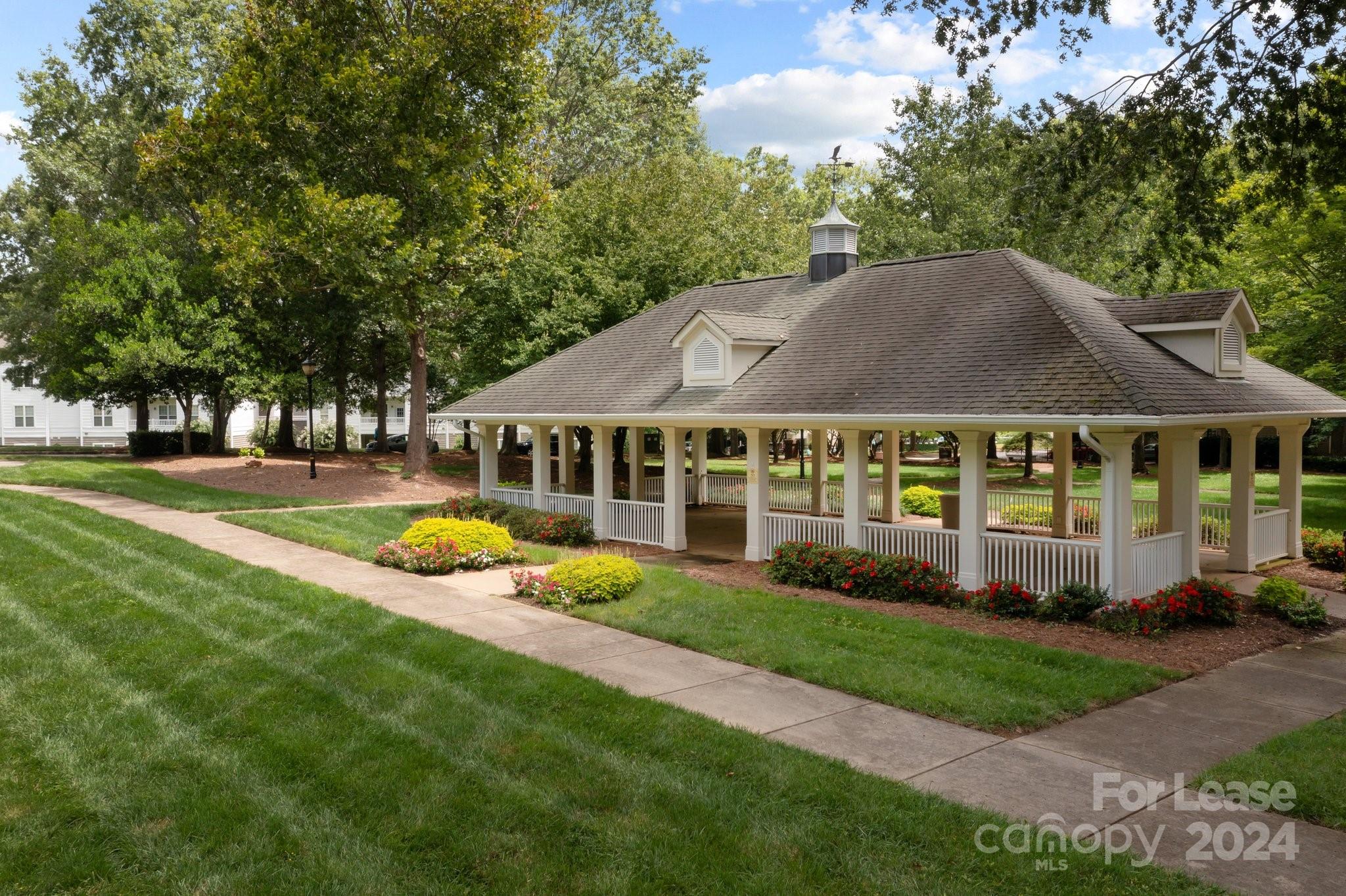 18605 Ruffner Drive, Unit 1C Cornelius, NC 28031 - Photo 24 of 27 a view of house with garden