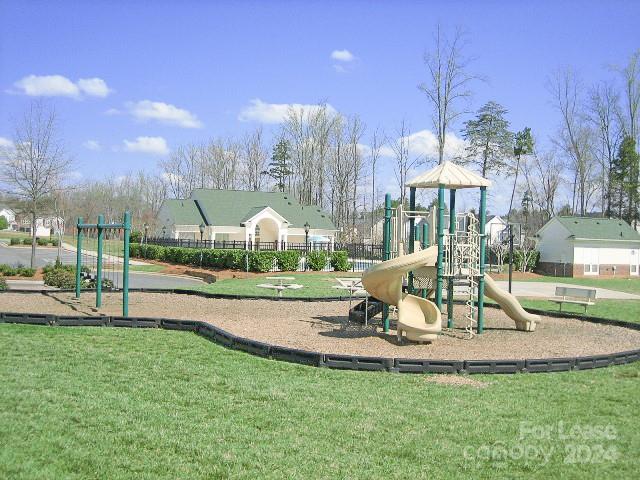 18605 Ruffner Drive, Unit 1C Cornelius, NC 28031 - Photo 27 of 27 a view of a park with swings