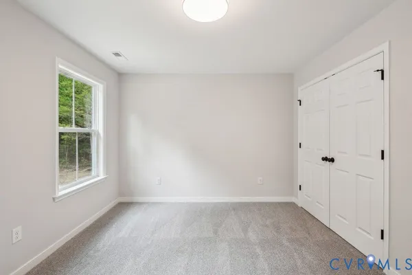 a view of a livingroom with wooden floor