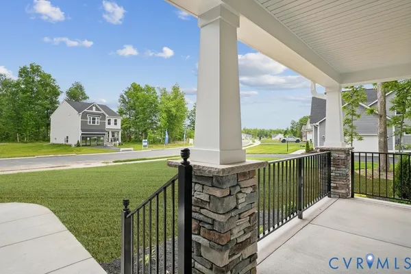 a view of balcony with yard