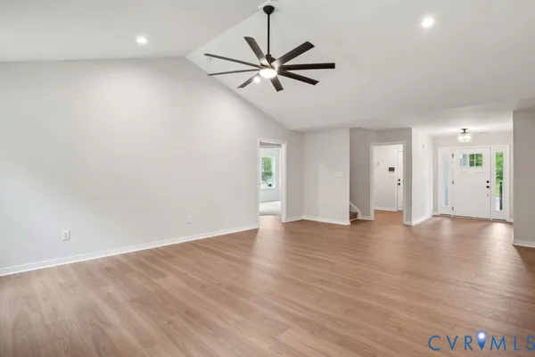 a view of an empty room with a window