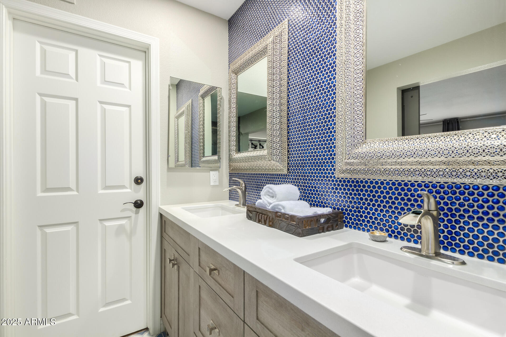 2551 East Missouri Avenue Phoenix, AZ 85016 - Photo 14 of 25 a bathroom with a sink and a mirror