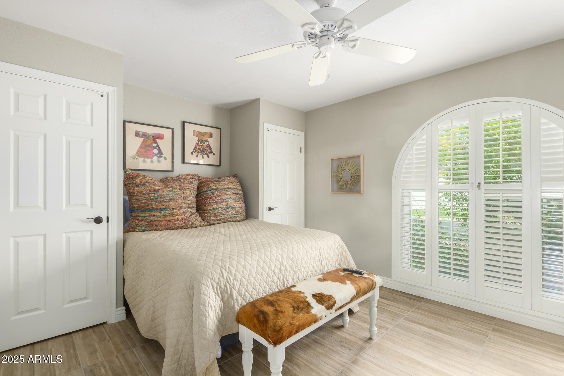 2551 East Missouri Avenue Phoenix, AZ 85016 - Photo 17 of 25 a bedroom with a bed and a window