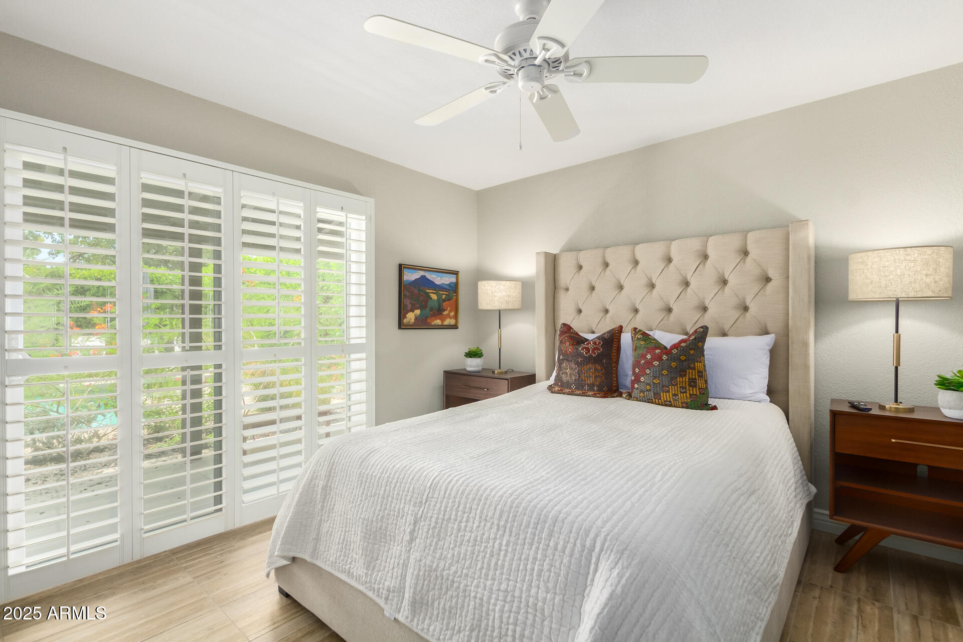 2551 East Missouri Avenue Phoenix, AZ 85016 - Photo 18 of 25 a bedroom with a large bed and a window