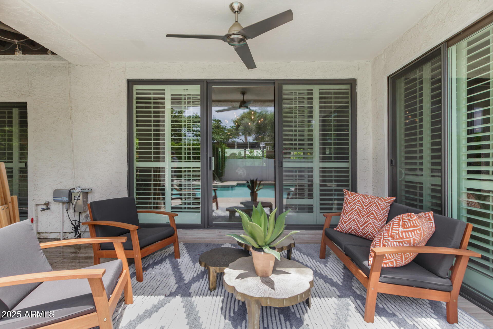 2551 East Missouri Avenue Phoenix, AZ 85016 - Photo 22 of 25 a outdoor living space with furniture and a potted plant