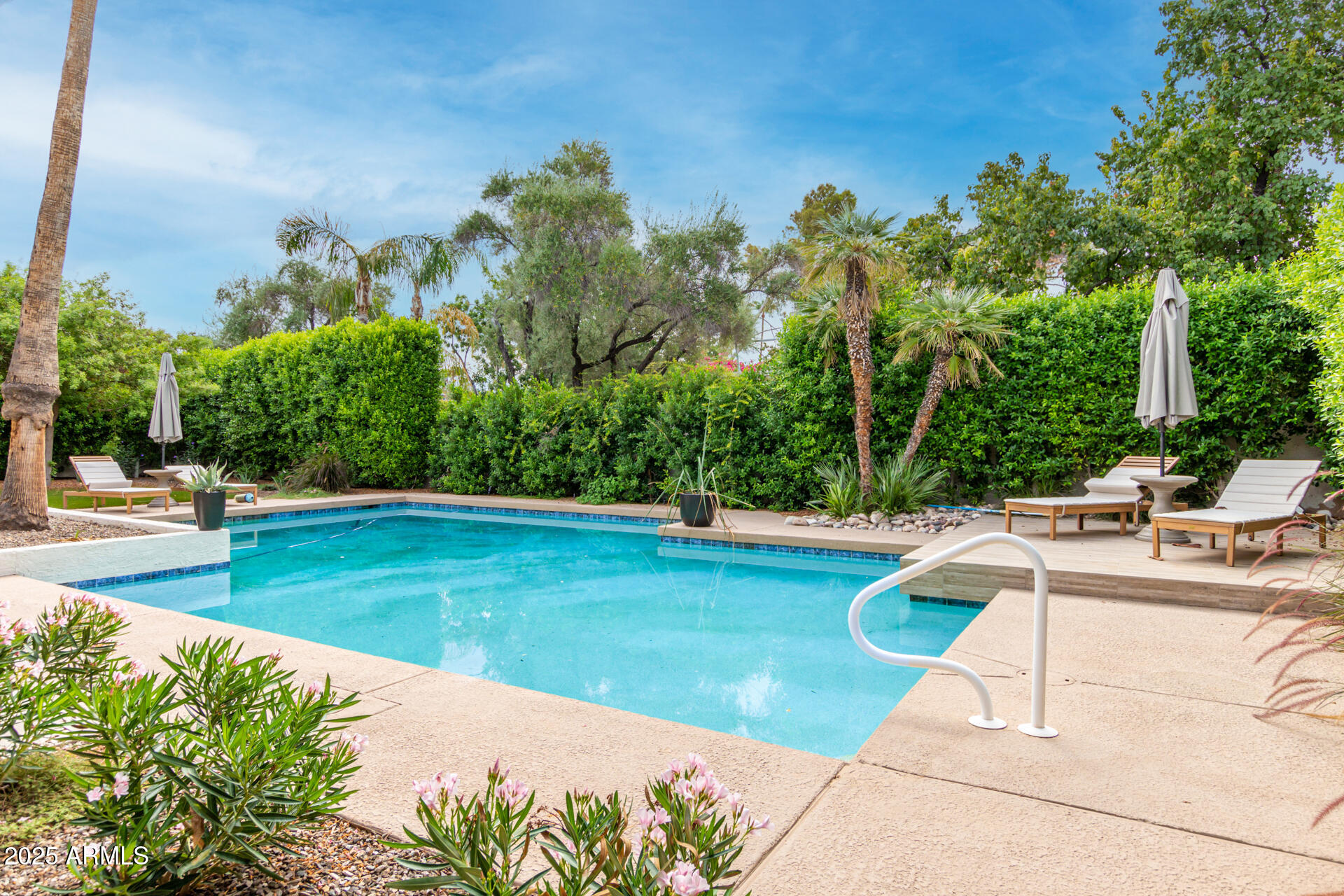 2551 East Missouri Avenue Phoenix, AZ 85016 - Photo 25 of 25 a view of a swimming pool with lounge chair