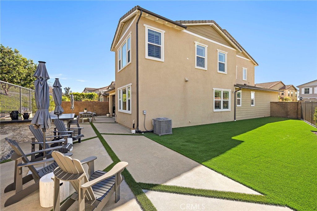 2 Ventada Street Rancho Mission Viejo, CA 92694 - Photo 24 of 71 a front view of a house with a yard