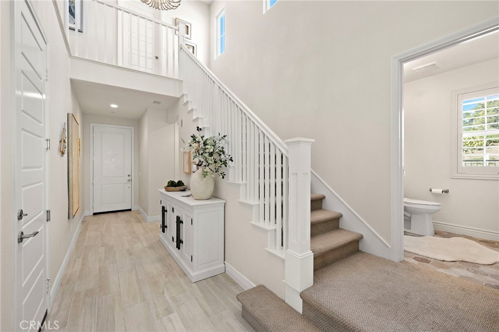 2 Ventada Street Rancho Mission Viejo, CA 92694 - Photo 3 of 71 a view of entryway with chandelier and wooden floor