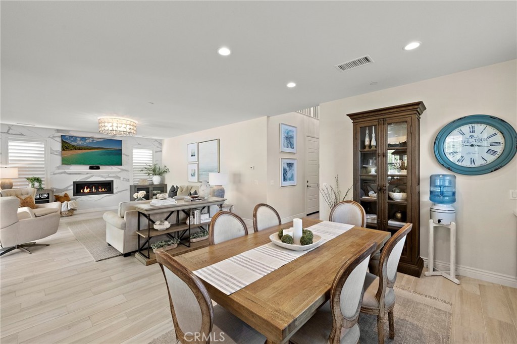 2 Ventada Street Rancho Mission Viejo, CA 92694 - Photo 7 of 71 a view of a a dining room with furniture window and wooden floor