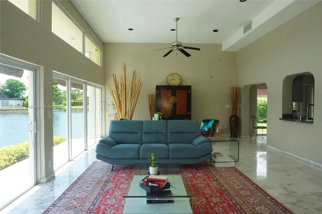 a living room with furniture and a window