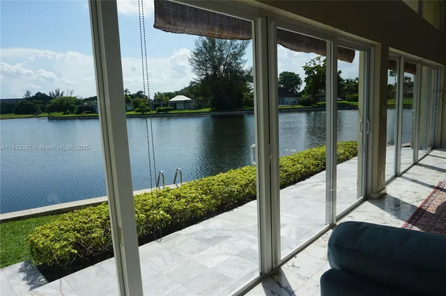 a view of a room with large window