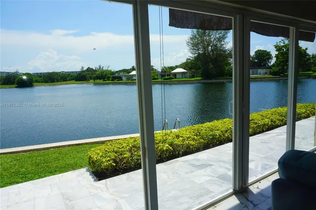 a view of a lake from a balcony