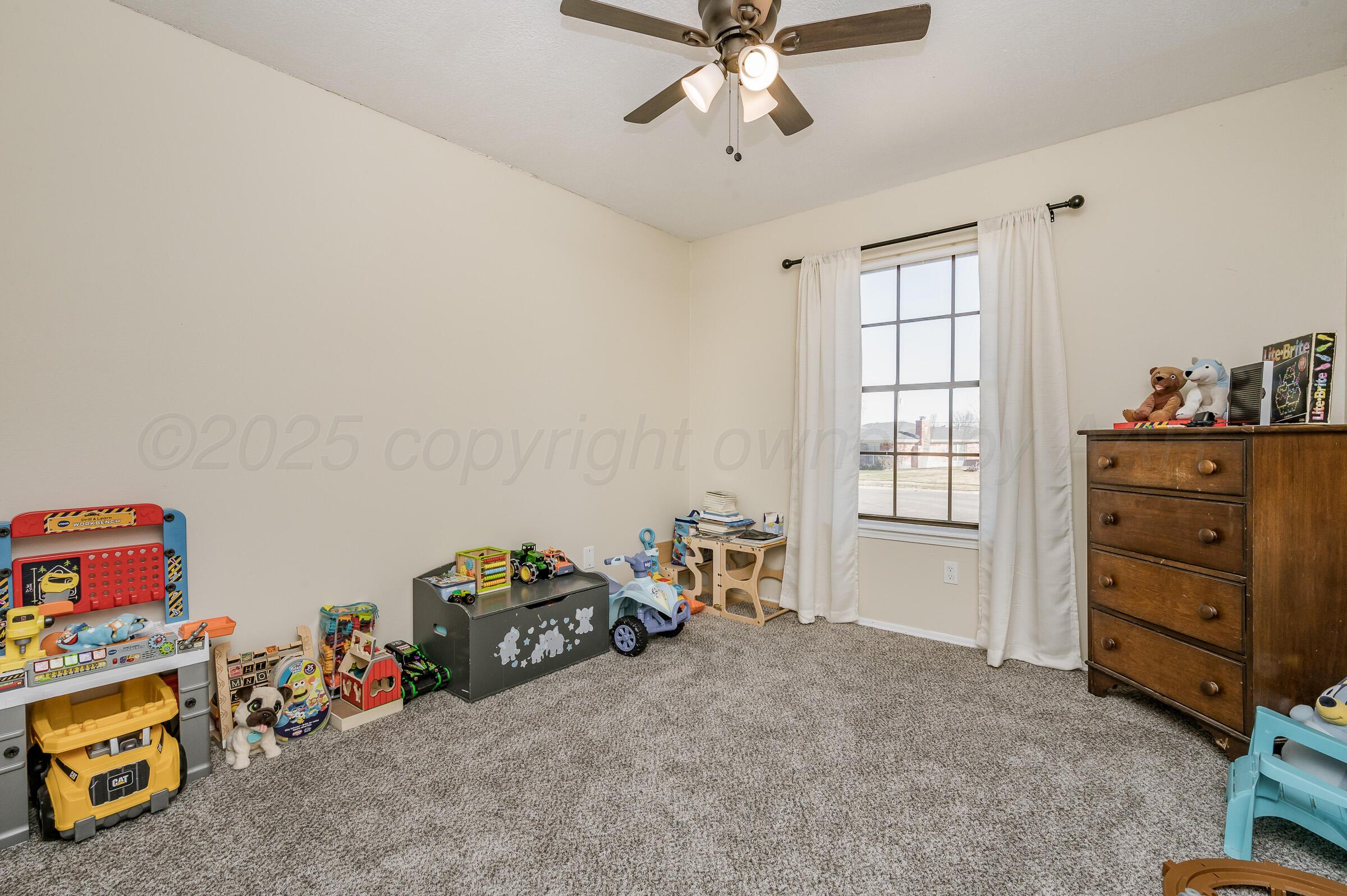 5336 Wheeler Lane Amarillo, TX 79110 - Photo 14 of 24 a view of a workspace with furniture and a window
