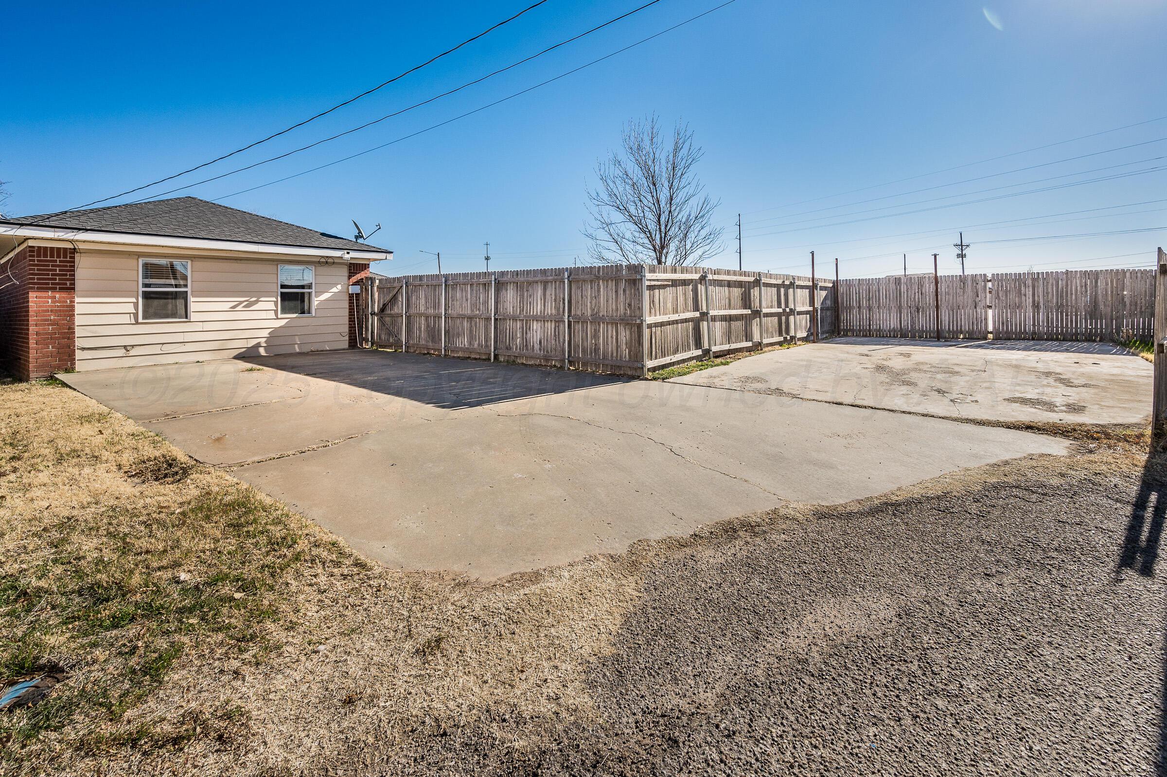 5336 Wheeler Lane Amarillo, TX 79110 - Photo 22 of 24 a view of a backyard