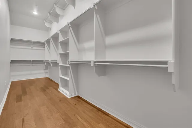 a view of an empty walk in closet