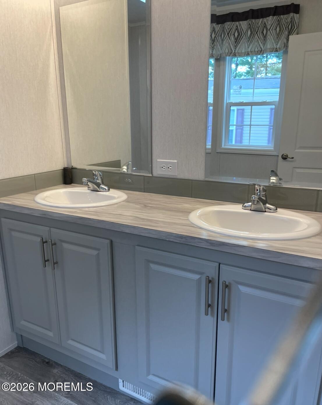 10 Muskrat Place Whiting, NJ 08759 - Photo 14 of 18 a bathroom with a sink and a mirror