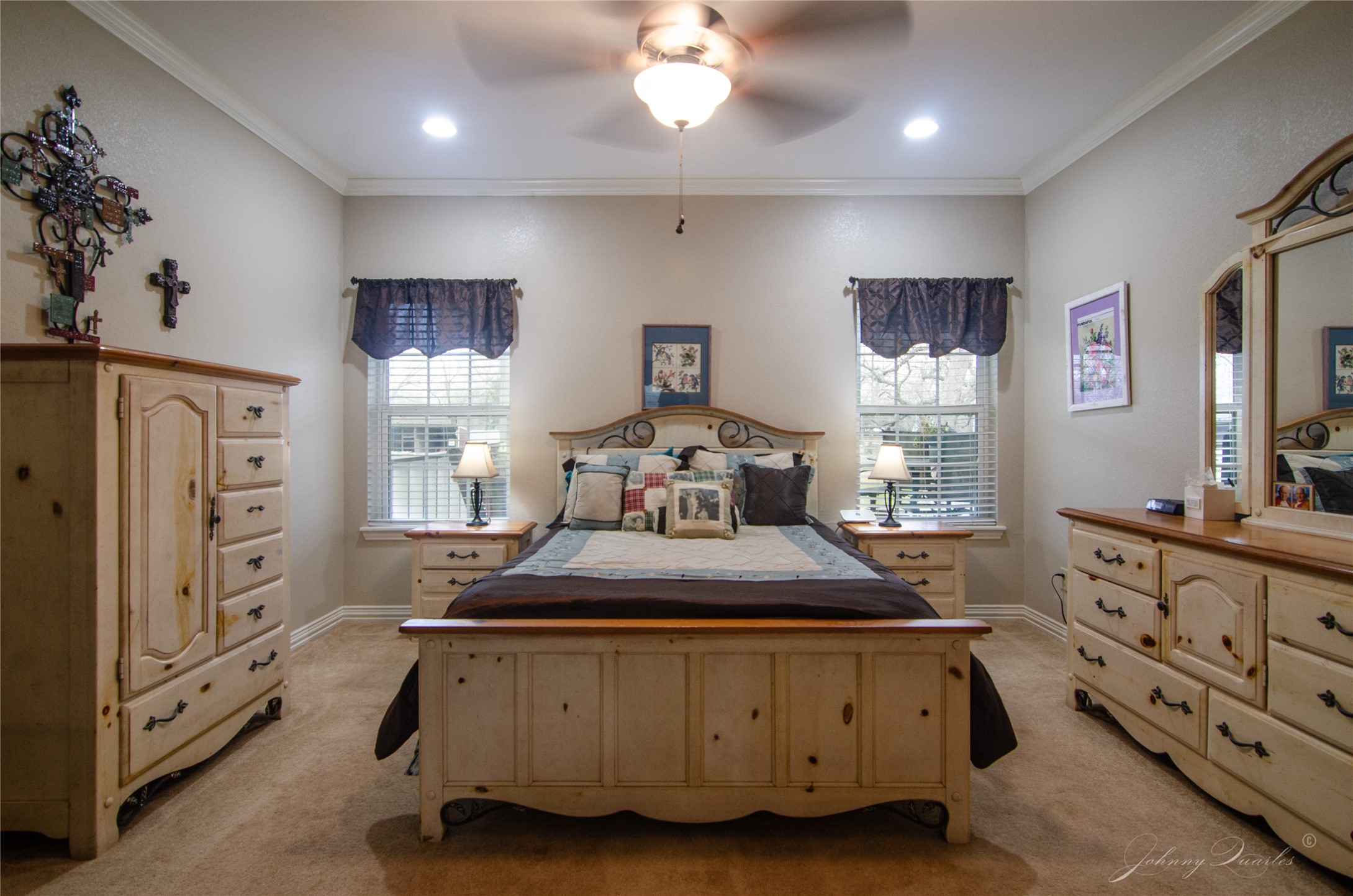 36606 Tejas Road Simonton, TX 77485 - Photo 20 of 32 a bedroom with a bed and a flat tv screen on the dresser