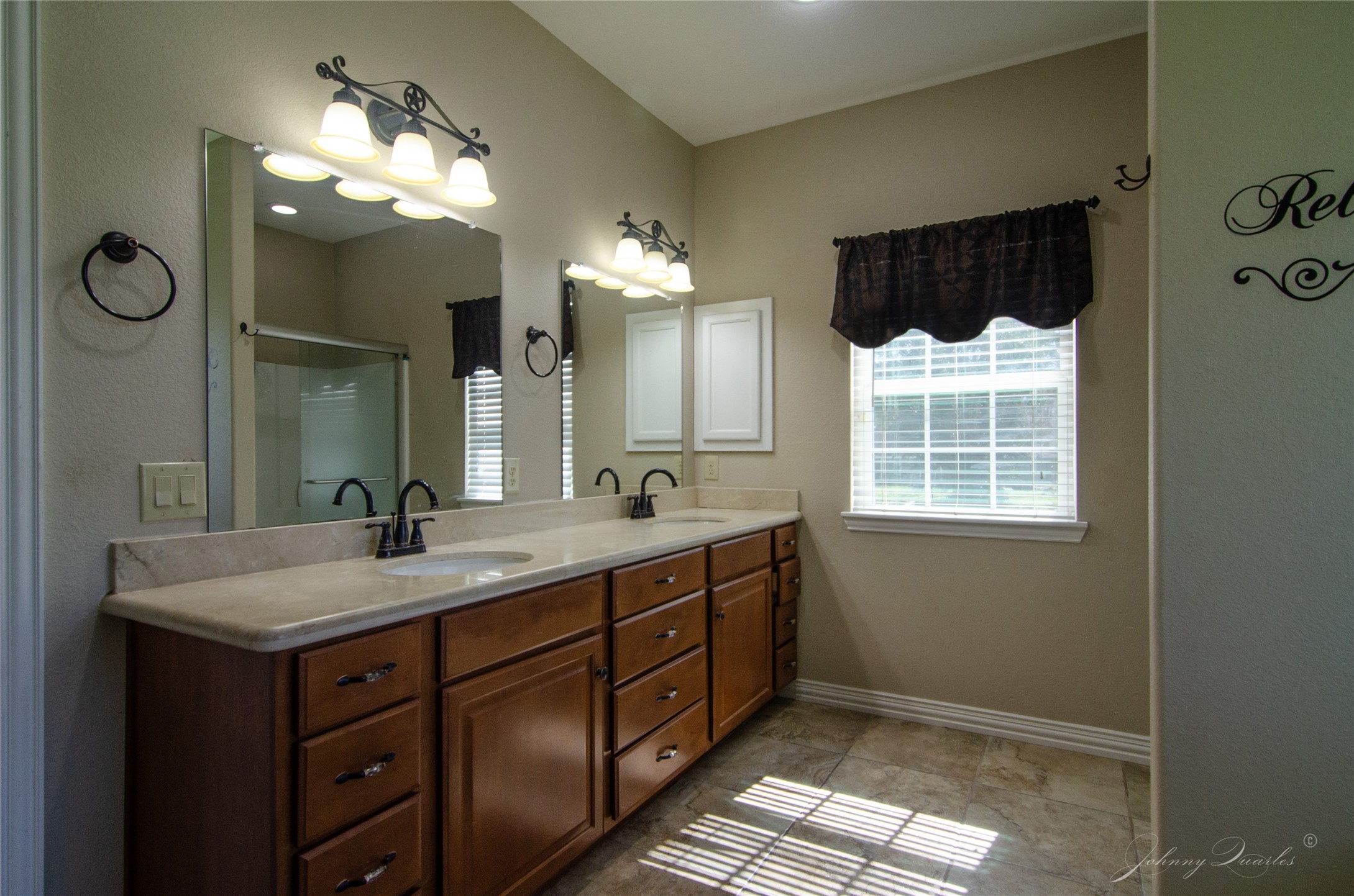 36606 Tejas Road Simonton, TX 77485 - Photo 22 of 32 a bathroom with a sink double vanity and a mirror
