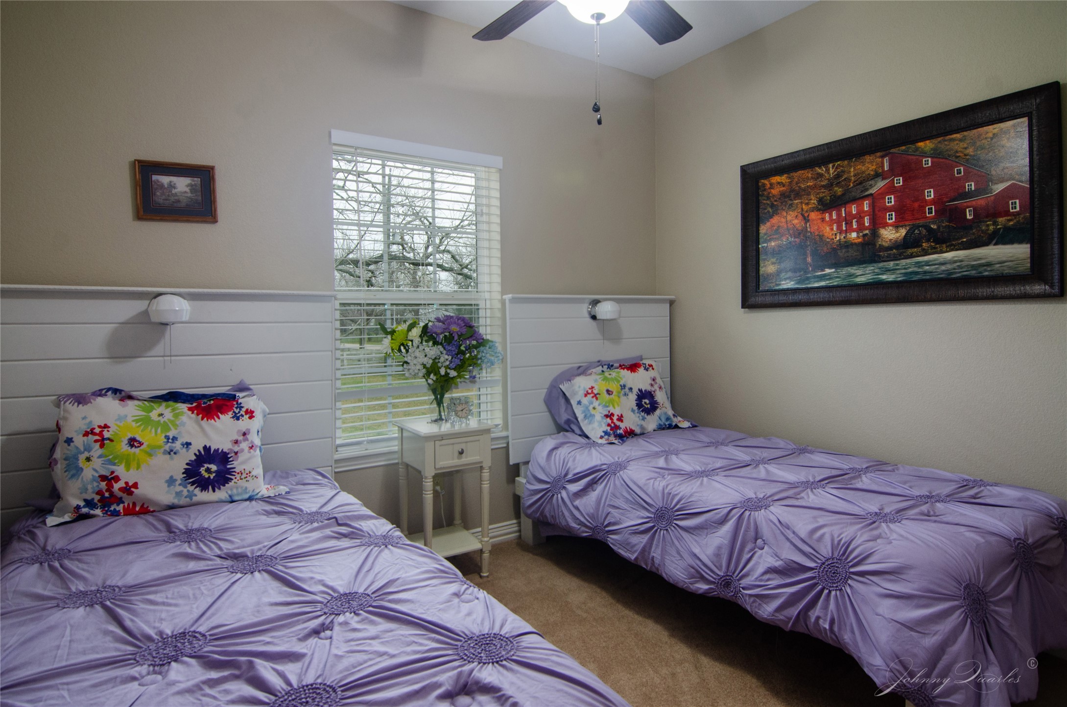 36606 Tejas Road Simonton, TX 77485 - Photo 25 of 32 a bedroom with a bed and a painting on the wall
