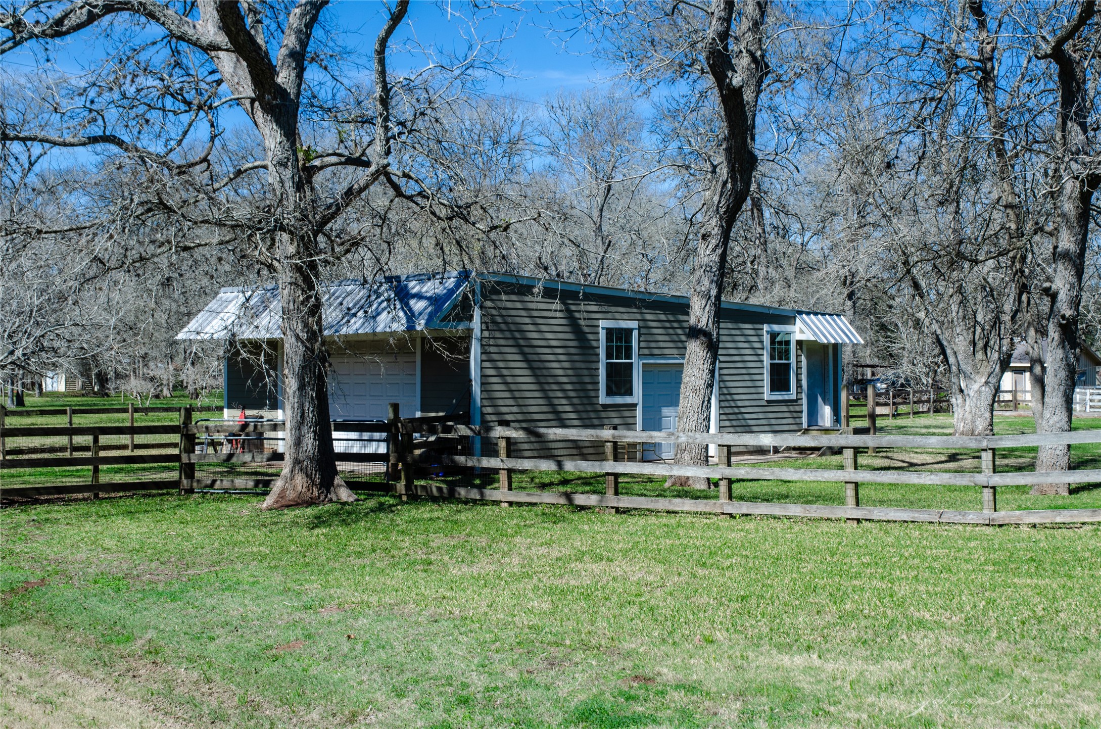 36606 Tejas Road Simonton, TX 77485 - Photo 28 of 32 front view of a house with a yard