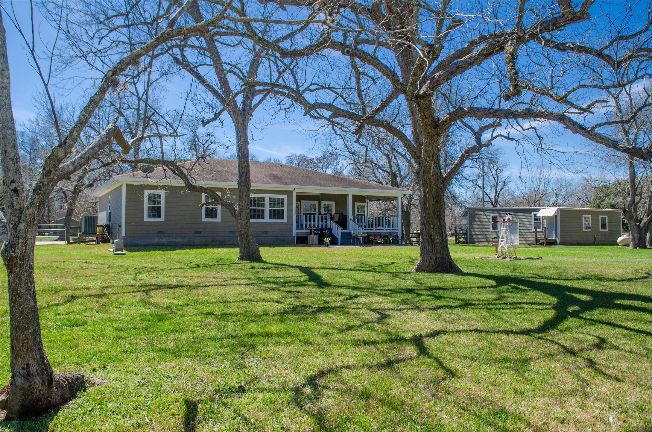 36606 Tejas Road Simonton, TX 77485 - Photo 5 of 32 a view of a house with a yard
