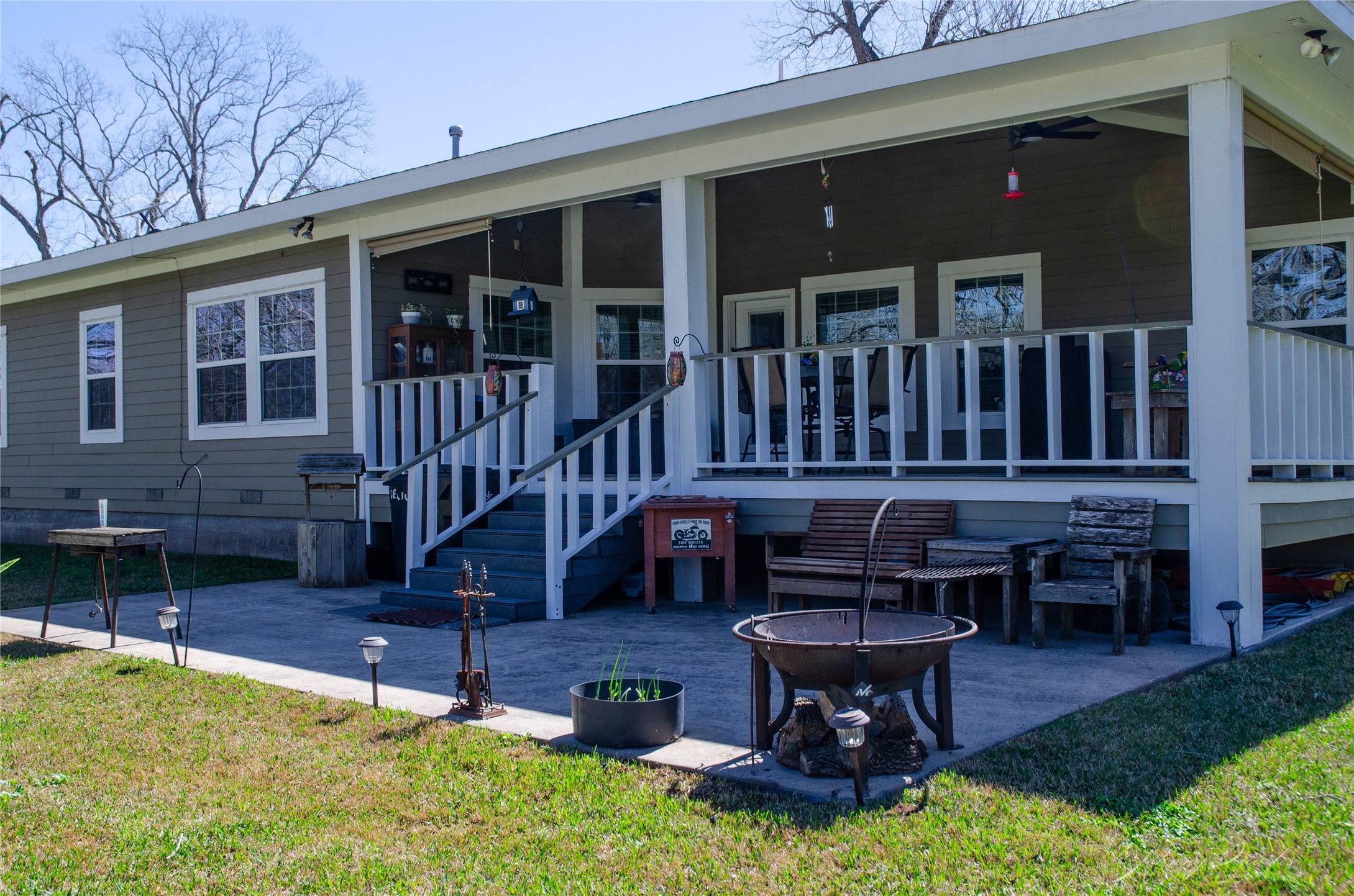 36606 Tejas Road Simonton, TX 77485 - Photo 7 of 32 a view of a house with backyard porch and sitting area