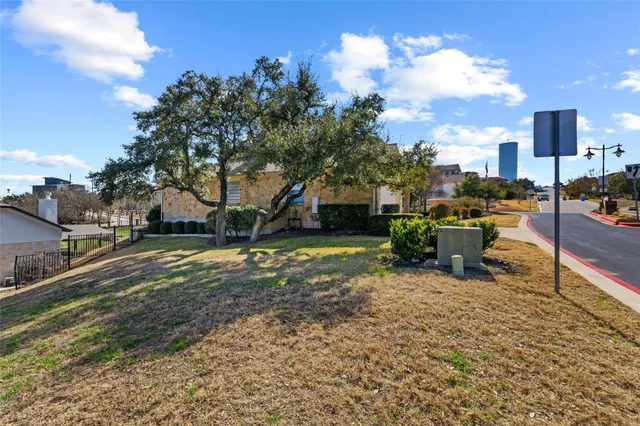a view of a playground with a yard