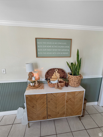 1716 Sagewood Road Price, UT 84501 - Photo 10 of 73 Detailed view of a wainscoted wall, crown molding, and wood walls