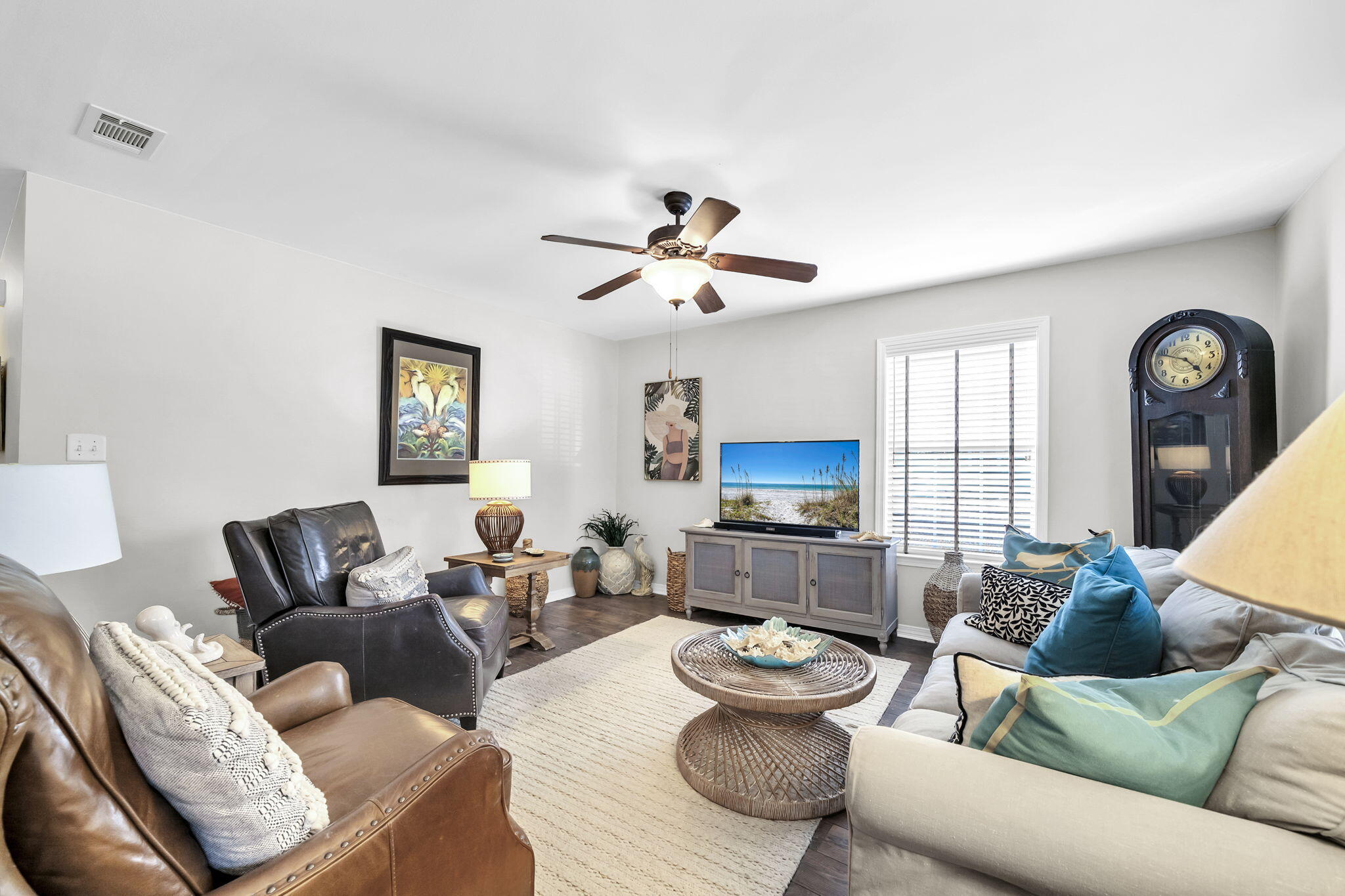386 Hunters Road Santa Rosa Beach, FL 32459 - Photo 12 of 35 a living room with furniture a fireplace and a window