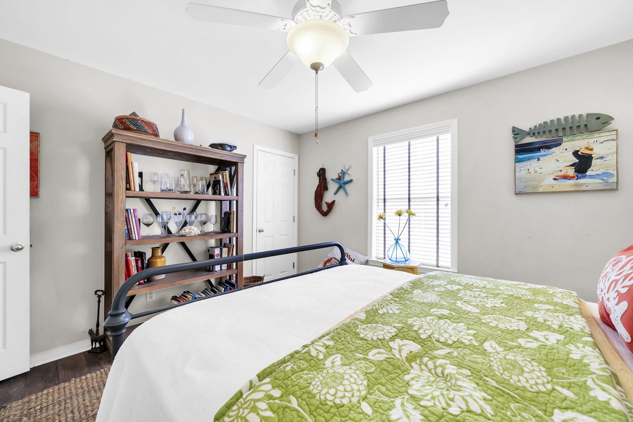 386 Hunters Road Santa Rosa Beach, FL 32459 - Photo 25 of 35 a bedroom with a bed and a chandelier