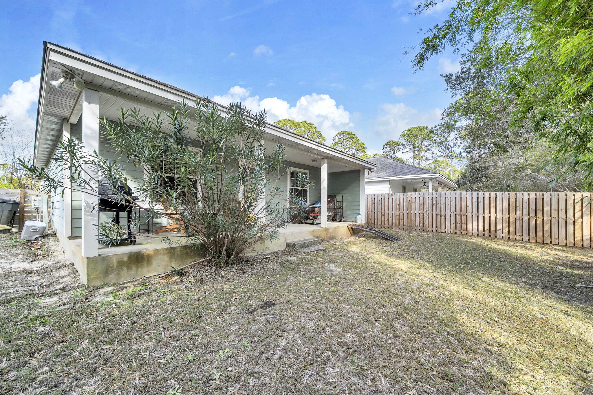 386 Hunters Road Santa Rosa Beach, FL 32459 - Photo 31 of 35 a view of a house with a porch