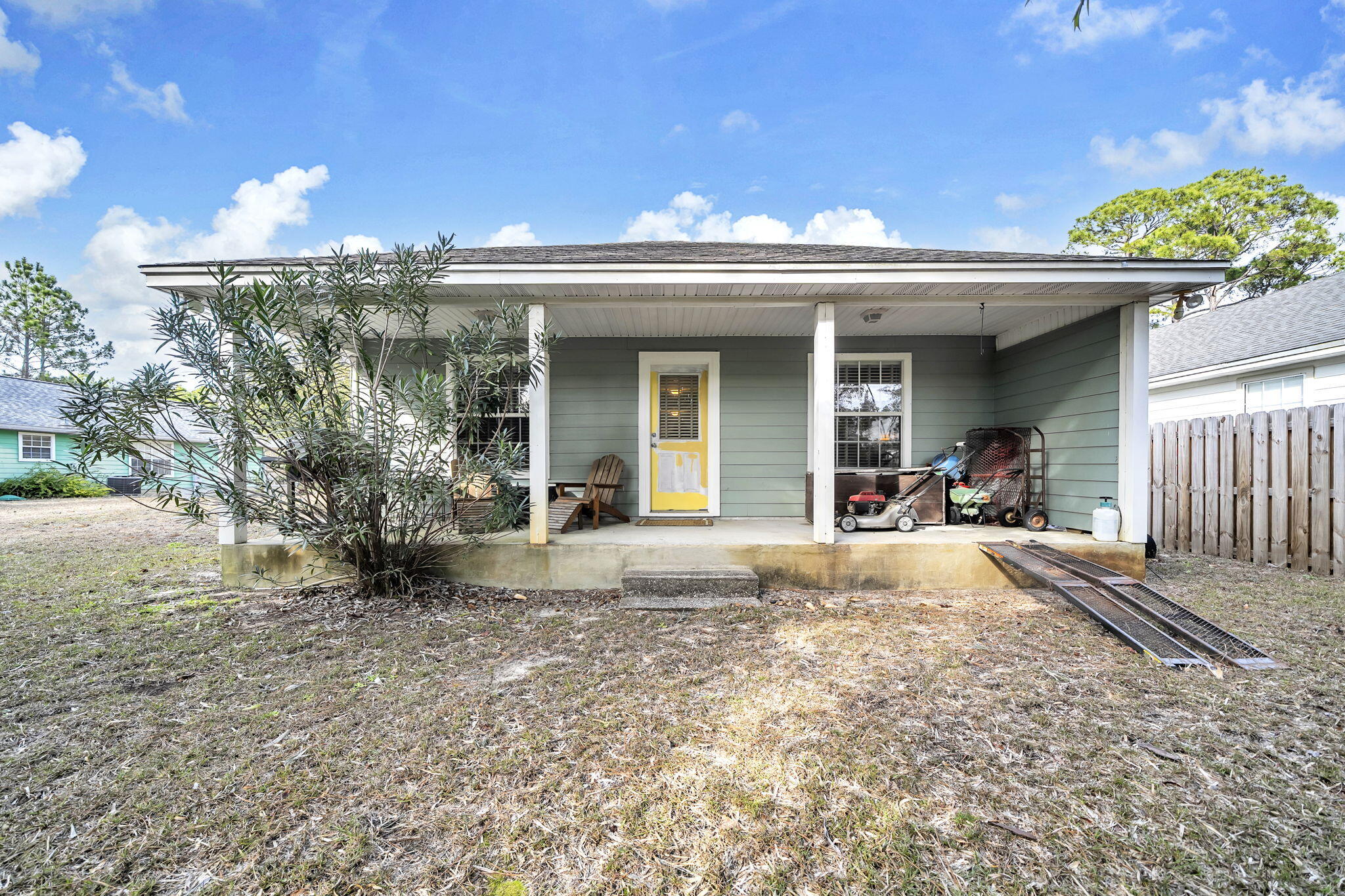 386 Hunters Road Santa Rosa Beach, FL 32459 - Photo 35 of 35 a view of a house with a patio