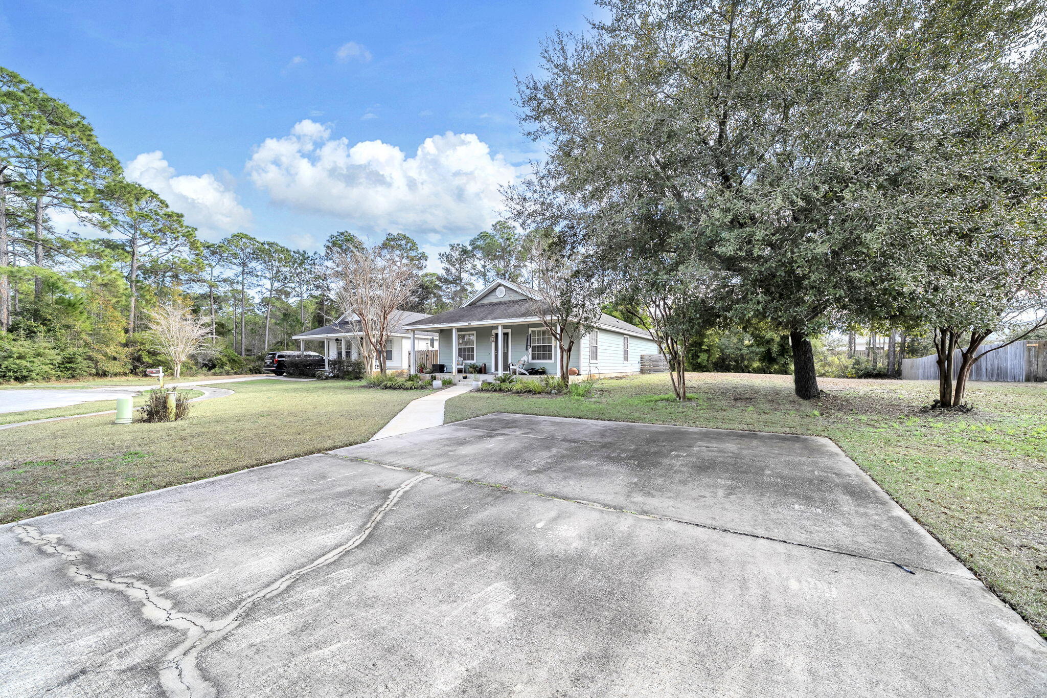 386 Hunters Road Santa Rosa Beach, FL 32459 - Photo 4 of 35 a view of a house with a yard