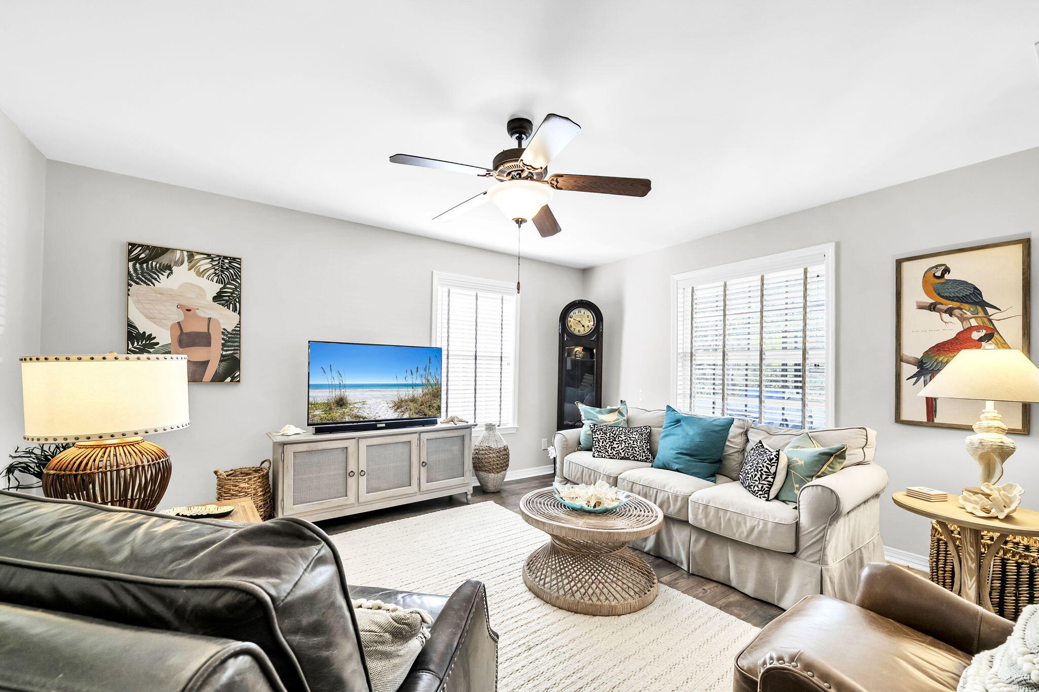 386 Hunters Road Santa Rosa Beach, FL 32459 - Photo 8 of 35 a living room with furniture a flat screen tv and a large window