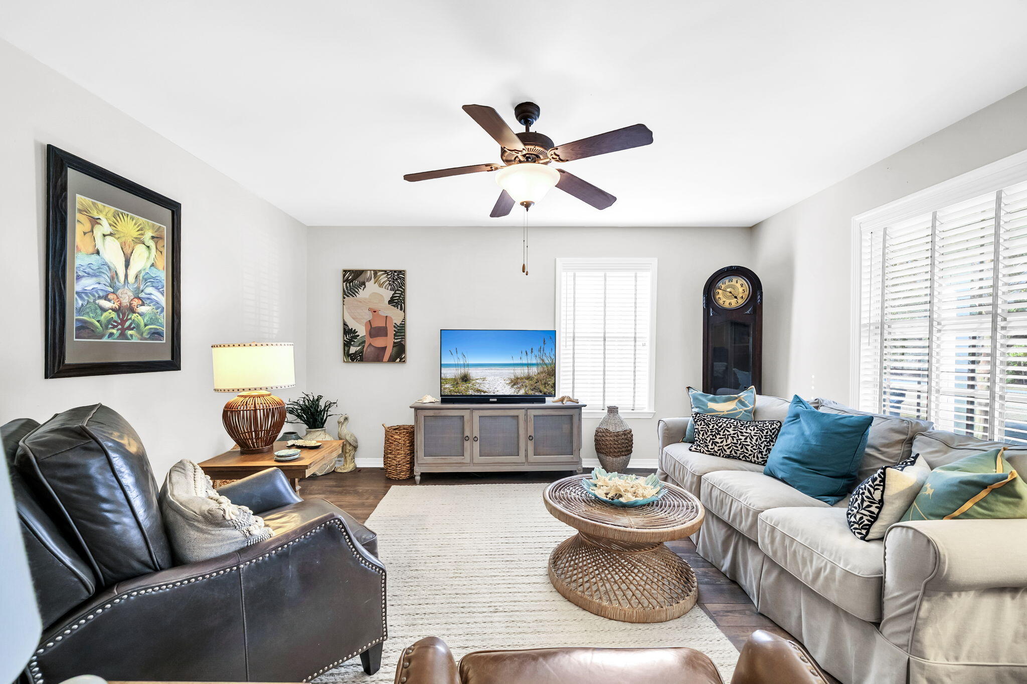 386 Hunters Road Santa Rosa Beach, FL 32459 - Photo 10 of 35 a living room with furniture a fireplace and a large window