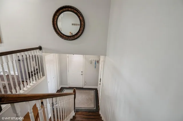a front view of a house with wooden floor